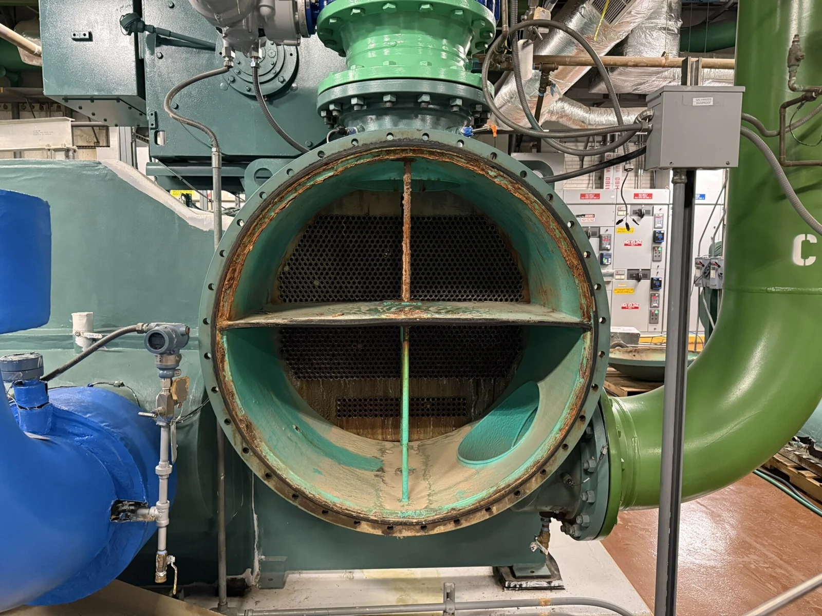 Disassembled chiller heat exchanger; archive illustration, not the new Valeo product
