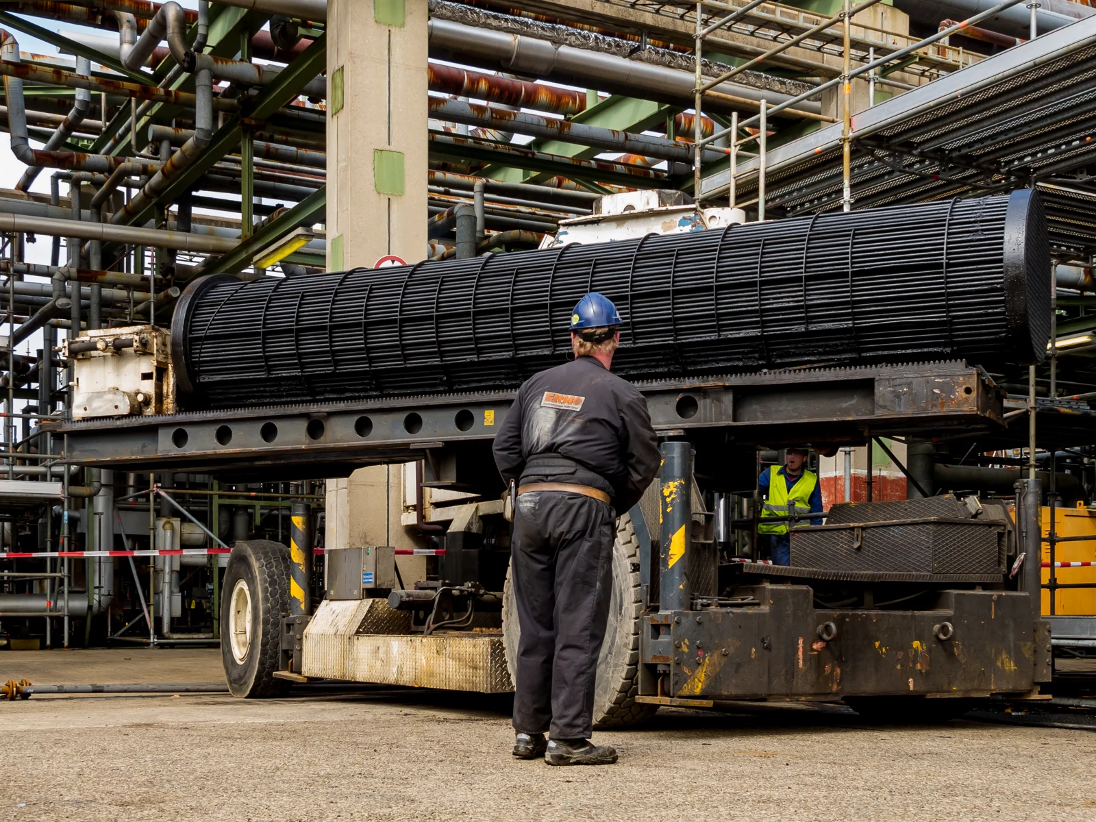 Industrial heat-exchanger maintenance in Cologne; contextual archive photograph