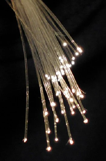 Optical-fibre strands from an archival photograph; not a Huawei WAN deployment or QKD test.
